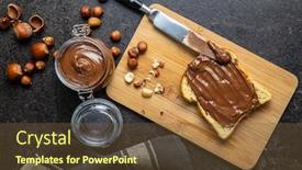  Presentation with spread - Amazing PPT theme having toast-bread-with-hazelnut-spread backdrop and a tawny brown colored foreground