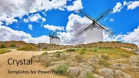  Presentation with blue sky - Amazing PPT theme having spain route of don quixote backdrop and a yellow colored foreground