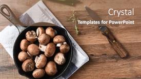  Presentation with iron - Theme featuring top view of a cast iron skillet filled with fresh mushrooms about to be sauteed background and a coral colored foreground