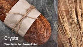  Presentation with slate - Colorful theme enhanced with top view of a loaf of multi-grain bread on a slate surface and wheat stalks backdrop and a tawny brown colored foreground