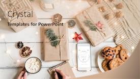  Presentation with cookies christmas - PPT layouts having top view of female hands with pen over notebook holding mug with hot drink among packed gifts cookies and christmas decorations background and a lemonade colored foreground