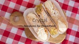  Presentation with checkered tablecloth - Audience pleasing theme consisting of top-view-of-fresh-cannoli backdrop and a coral colored foreground