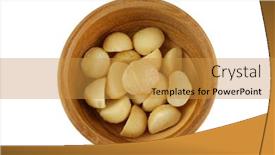  Presentation with macadamia nuts - Slides with top view of roasted salted macadamia nuts with salt in wooden bowl isolated on white background background and a gold colored foreground