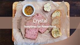  Presentation with meat food - Audience pleasing presentation consisting of top view of two pieces of seasoned meat presented with crusty bread rosemary and garnish food served on wooden cutting board backdrop and a coral colored foreground