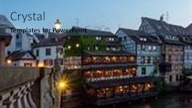  Presentation with area - Audience pleasing presentation design consisting of tourist-area-petite-france backdrop and a light blue colored foreground