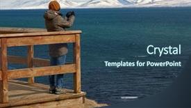  Presentation with coastal - Beautiful PPT theme featuring tourist standing on wooden lookout point deck taking a photo of the beautiful coastal scenery with snow capped mountains in background backdrop and a ocean colored foreground