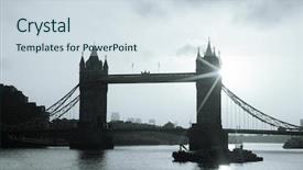  Presentation with london - Audience pleasing presentation theme consisting of bridge silhouette over thames river backdrop and a sky blue colored foreground