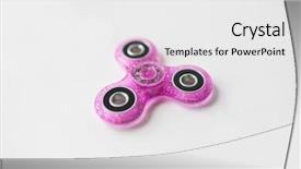  Presentation with pink gold glitter - Audience pleasing presentation theme consisting of object - pink glittered fidget spinner backdrop and a white colored foreground