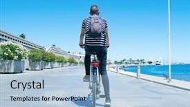  Presentation with cycling - Theme enhanced with traction - young caucasian man seen background and a light blue colored foreground