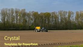  Presentation with sprayer - PPT theme enhanced with tractor-with-sprayer-during-spring background and a tawny brown colored foreground