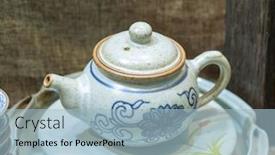  Presentation with ceremony - Audience pleasing PPT theme consisting of traditional chinese teapot used in tea ceremony backdrop and a light blue colored foreground