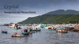  Presentation with permit - Colorful slides enhanced with traditional colorful vietnamese fishing boats in ben ngu wharf of nam du islands kien giang vietnam nam du has become a popular tourist attraction but foreigner are only allowed in with a permit backdrop and a ocean colored foreground
