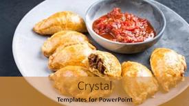  Presentation with dip - Audience pleasing theme consisting of traditional-south-american-empanada-de backdrop and a gold colored foreground