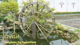  Presentation with spinning wheel - Colorful presentation theme enhanced with traditional-wooden-water-wheel-spinning backdrop and a tawny brown colored foreground