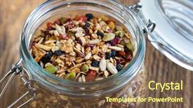  Presentation with granola - PPT theme consisting of trail mix - homemade granola in open glass background and a tawny brown colored foreground