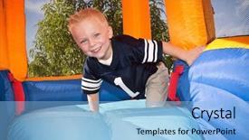  Presentation with 2nd birthday for baby boy - Presentation consisting of trampoline - boy playing on and inflatable background and a light blue colored foreground