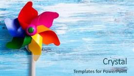  Presentation with pinwheel - Cool new presentation with tranning - closeup of a colorful pinwheel backdrop and a light blue colored foreground