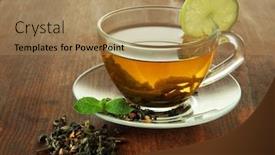  Presentation with green tea - Slide deck with transparent cup of green tea with lime on wooden background background and a coral colored foreground