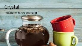  Presentation with black-tea - Audience pleasing presentation consisting of transparent-glass-teapot-with-black backdrop and a light blue colored foreground