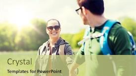  Presentation with tourism hiking - Presentation design featuring travel hiking backpacking tourism and people concept - happy couple with backpacks holding hands and walking along country road outdoors background and a soft green colored foreground