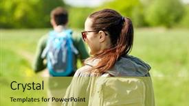  Presentation with tourism hiking - PPT layouts featuring travel hiking backpacking tourism and people concept - close up of couple with backpacks walking along country road background and a yellow colored foreground