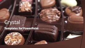  Presentation with luxury - Slides enhanced with tray of luxury chocolates in a box seen close-up from the side background and a tawny brown colored foreground
