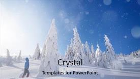  Presentation with winter evergreen forest - Cool new presentation theme with guy stands in a snowdrift backdrop and a light blue colored foreground