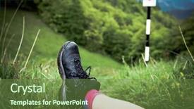  Presentation with trekking - Presentation theme with trekking break - woman's legs resting in green field above summer forest - focus on hiking boots background and a tawny brown colored foreground