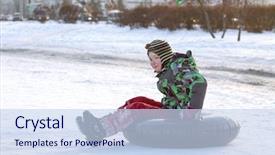  Presentation with snow blizzard in winter - PPT theme featuring tubes - happy boy with snow tube background and a sky blue colored foreground