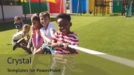  Presentation with ethnic group - PPT theme consisting of tug of war in playground background and a tawny brown colored foreground