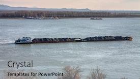  Presentation with tugboat - PPT theme consisting of tugboat-and-barge-transporting-coal background and a light gray colored foreground