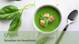  Presentation with spinach - Theme consisting of tureen with delicious spinach soup on wooden table background and a seafoam green colored foreground