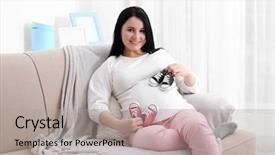  Presentation with baby shoes - PPT theme consisting of twins - beautiful young pregnant woman holding background and a light gray colored foreground