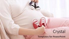  Presentation with baby shoes - Audience pleasing PPT layouts consisting of twins - closeup of pregnant woman holding backdrop and a coral colored foreground