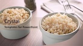 Presentation with brown rice - Presentation design consisting of two bowls of brown rice on wooden table background and a coral colored foreground