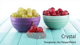  Presentation with green color - Slides consisting of two bowls of green and red grapes on color wooden surface isolated on white background background and a arctic colored foreground