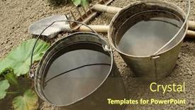  Presentation with vegetable gardening - Audience pleasing presentation theme consisting of two buckets with water and gardening tools on the vegetable bed backdrop and a tawny brown colored foreground