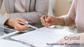  Presentation with consulting - Amazing PPT theme having two businesswomen consulting or discussing terms of contract with their hands over the document backdrop and a sky blue colored foreground