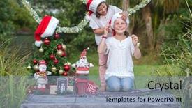  Presentation with summer christmas - Amazing PPT layouts having two child girls with chritmas backdrop and a light blue colored foreground