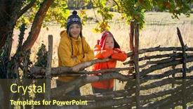  Presentation with play children - PPT theme enhanced with two children in hats stand at a tree fence boy play in village background and a tawny brown colored foreground