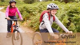  Presentation with man riding big bike motor - Cool new presentation theme with two children riding mountain bikes backdrop and a coral colored foreground