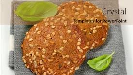  Presentation with almonds - PPT theme having two-cookies-with-chopped-nuts background and a gold colored foreground