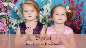  Presentation with prayer hands - Colorful presentation enhanced with two cute little girls in dresses sit with folded hands in prayer in room with flowers backdrop and a coral colored foreground
