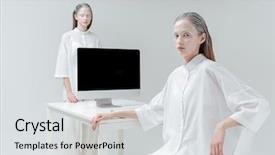  Presentation with standing sitting - Cool new slide set with two fashion beautiful girls sitting and standing near the desk with computer pc over gray background backdrop and a light gray colored foreground