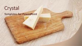  Presentation with triangle - Presentation theme consisting of two fresh triangle french delicacy parmesan cheese pieces on wooden cut board over table background and a lemonade colored foreground