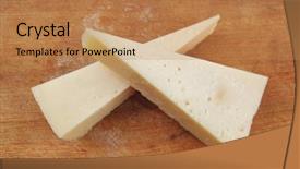  Presentation with triangle - Theme enhanced with two fresh triangle french delicacy parmesan cheese pieces on wooden cut board over table background and a coral colored foreground