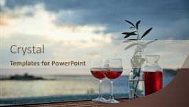  Presentation with blue rose - PPT layouts having two glasses of rose wine with olives against blue water on a pier background and a lemonade colored foreground