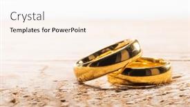  Presentation with golden wedding - PPT theme consisting of two-golden-wedding-rings background and a pink colored foreground