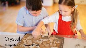  Presentation with baking cookies - Colorful presentation enhanced with two kids baking gingerbread cookies backdrop and a coral colored foreground