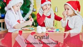  Presentation with christmas play - Slide set consisting of two little girls and one boy in santa caps play in food sitting at wooden table with attached socks for gifts in room with decorated christmas tree background and a red colored foreground